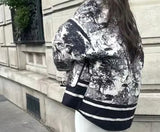 Fashionable Cotton Vintage Printed Jacket: Stylish woman in a black and white floral print jacket.