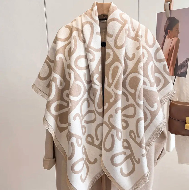 Stylish Cashmere design scarf showcased on stand - white and beige color scheme.