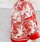 Cotton Vintage Printed Jacket - Woman in red and white jacket exuding style and elegance.