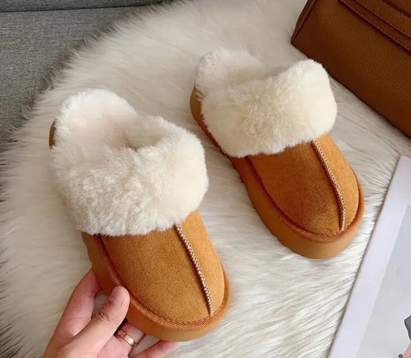 Stay cozy with Fur Slippers - Women's slippers featuring plush fur lining for added warmth and comfort.