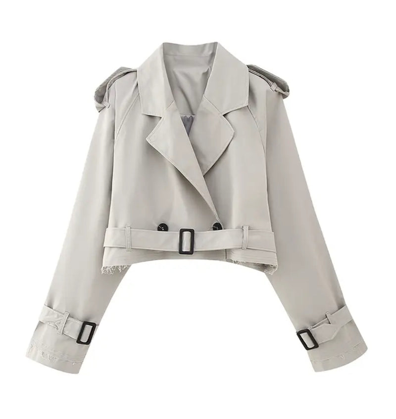 Cropped Trench Coat - White trench coat with black buttons, a stylish outerwear choice.