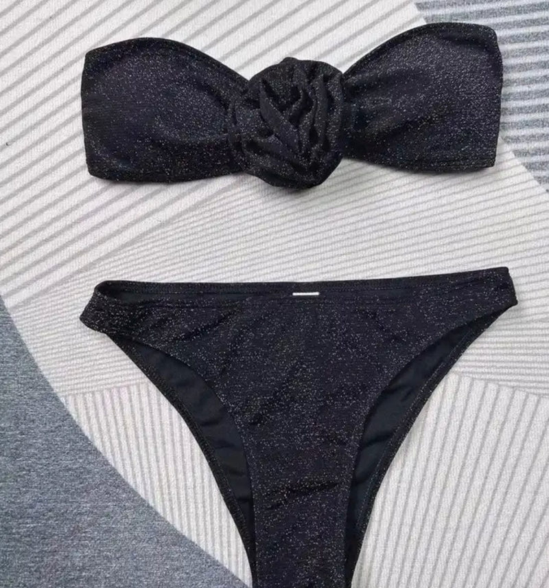 Stylish bikini set featuring a black bowtie. Complete your beach look with the Three pieces Bikini and Beach Cover Up in Rose.