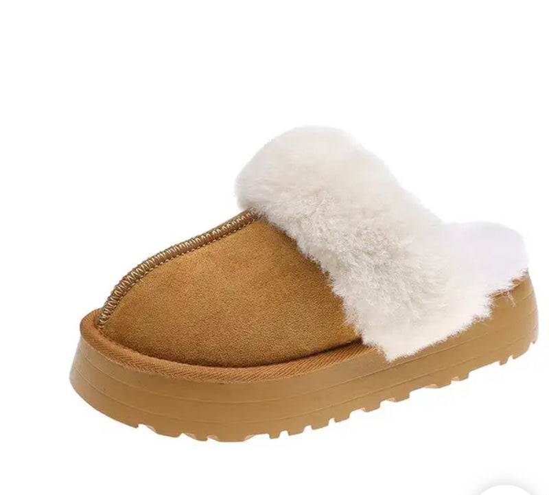 Fur Slippers: Women's slippers with cozy fur on the bottom for ultimate comfort