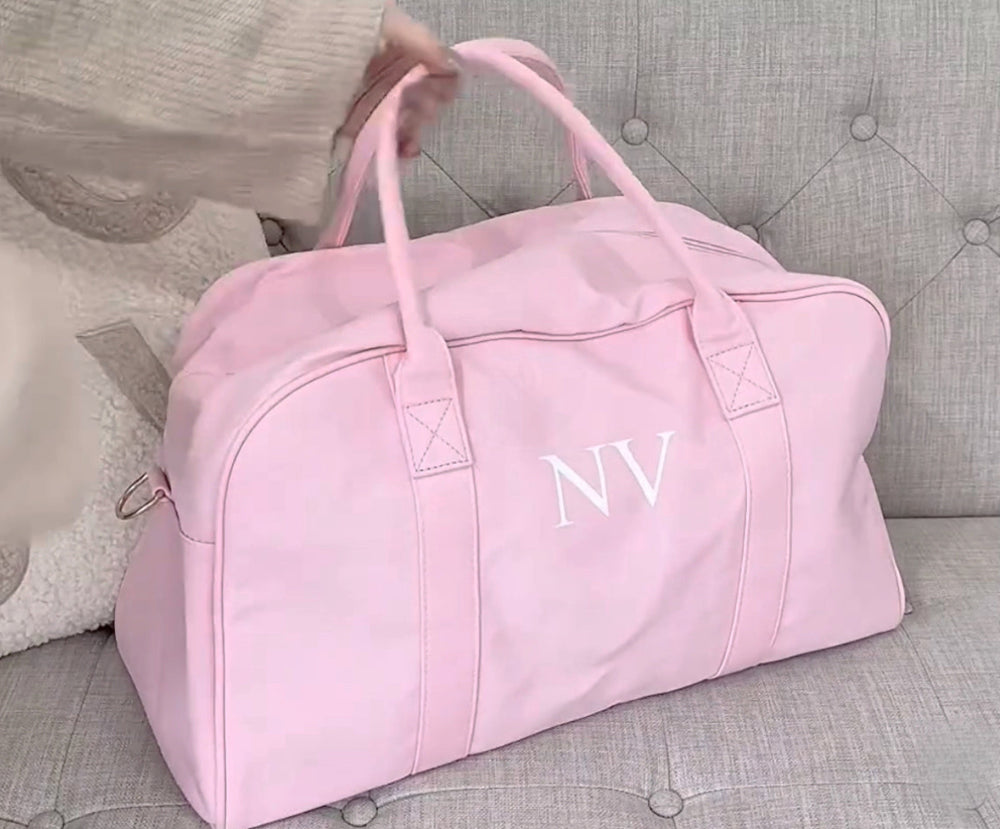 Pink duffel bags online