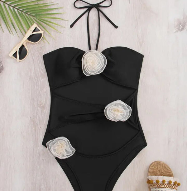Black one piece swimsuit with white flowers, product name: Rose Black and white Swimsuit.