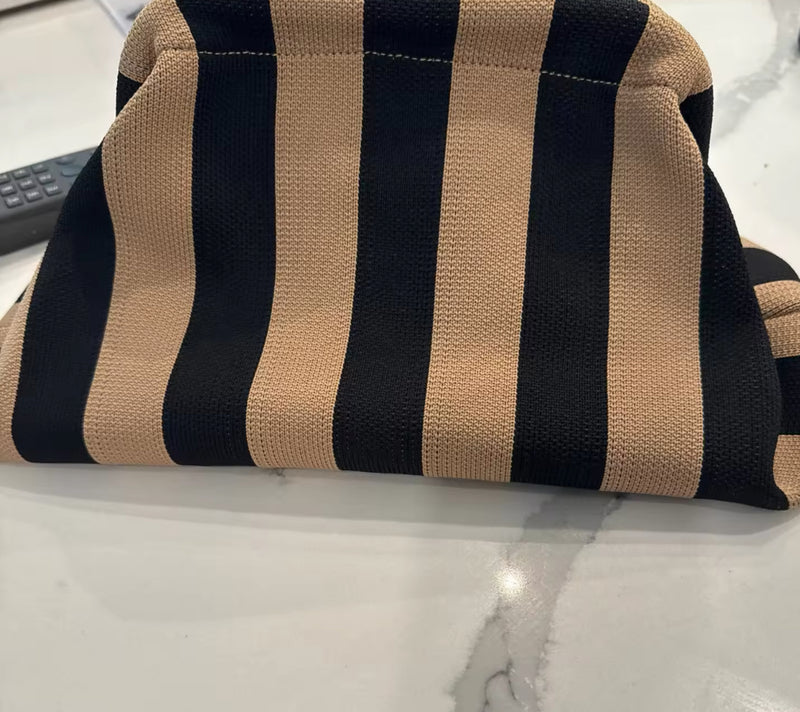 Black and cream clutch bag on sale