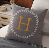 Gold letter H on white pillow, product name: H Cushion Cover
