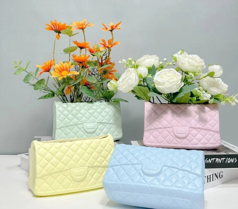 Three Quilted Handbag Vases in assorted colors with floral designs