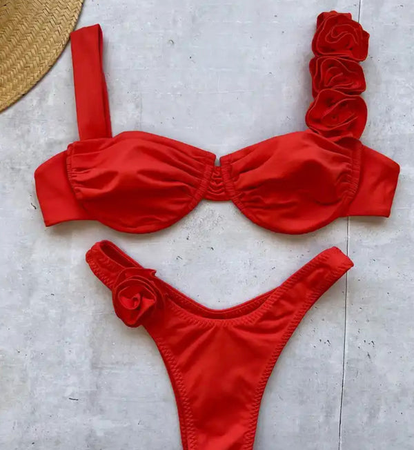 Rose bikini with flower detail, perfect for summer beach days.