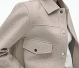 Stylish cropped pocket soft jacket in light gray, ideal for adding a chic touch to your look.