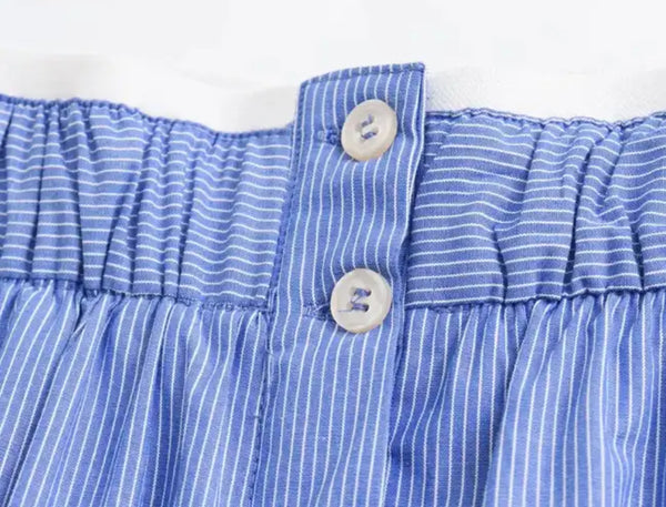 Blue and white striped shorts, perfect for a casual summer look. Shirt sold separately.