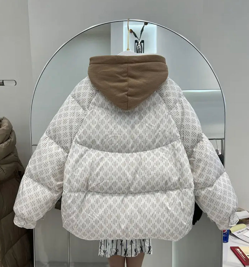 Pattern Down Puffer Jacket With Hood - a white and brown puffy jacket reflected in a mirror.