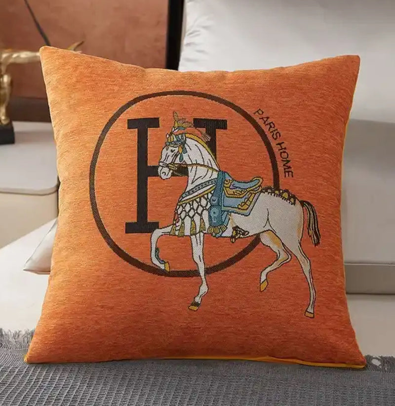 Elegant cushion cover adorned with a charming H horse motif, a lovely addition to your sofa or bed