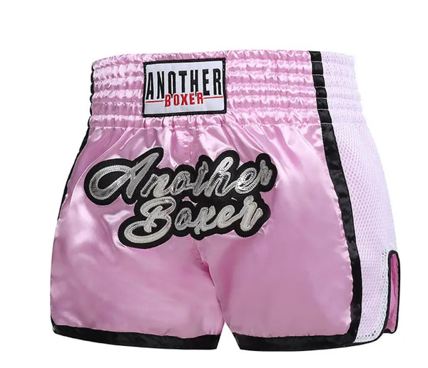 Pink Muay Thai shorts for women, perfect for another intense fight. Product name: Pink Boxing Shorts.
