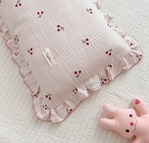 Cherry and flower patterned pillow case, baby pink and red, with pretty ruffle details