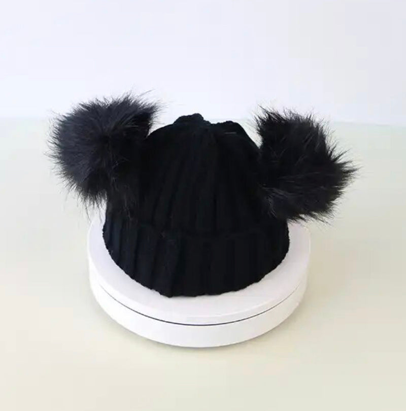 Baby And Kids Beanie with fur Embroidered: Stylish black hat with two fluffy pom poms.
