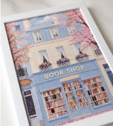 Pastel book shop wall art print with white frame A4 or A3 size