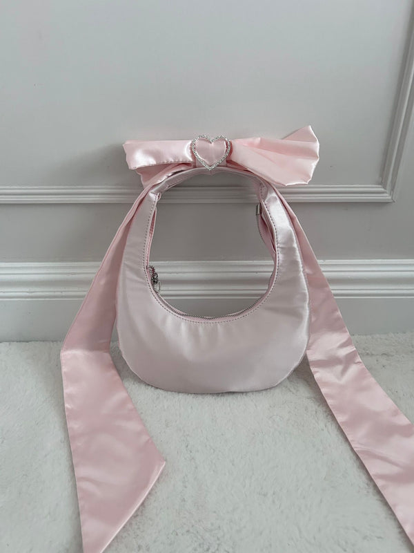 Pink Satin Bow Bag - Elegant handbag with a satin finish and a charming bow detail.