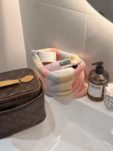 Pastel striped make up bags