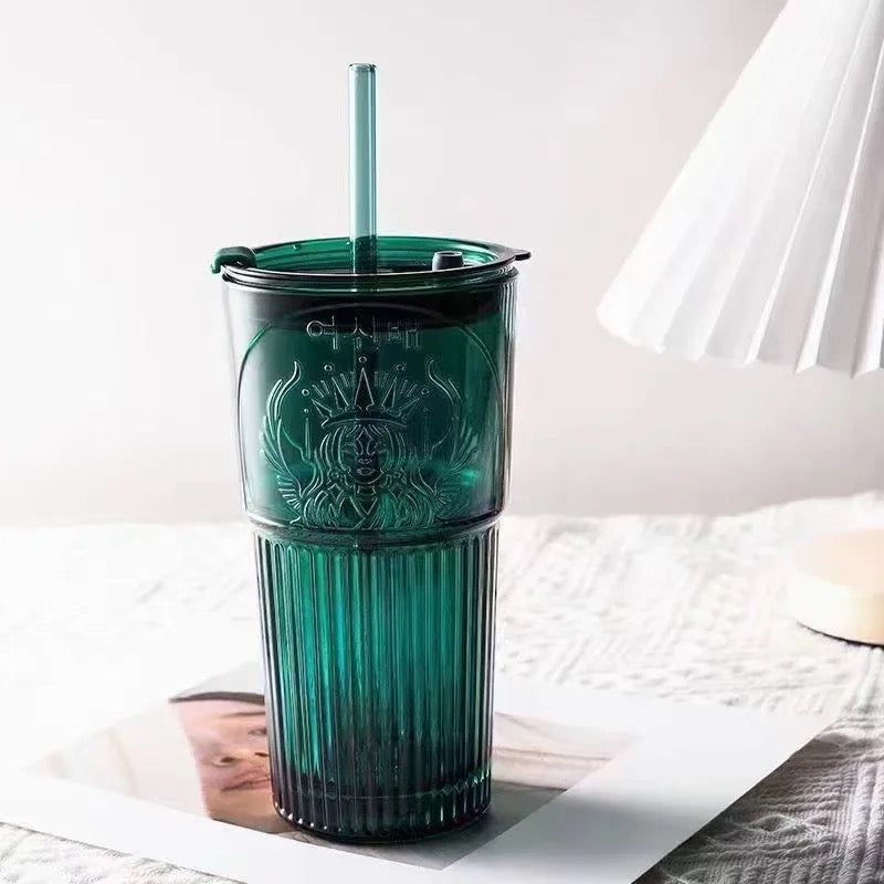 glass with straw and lid