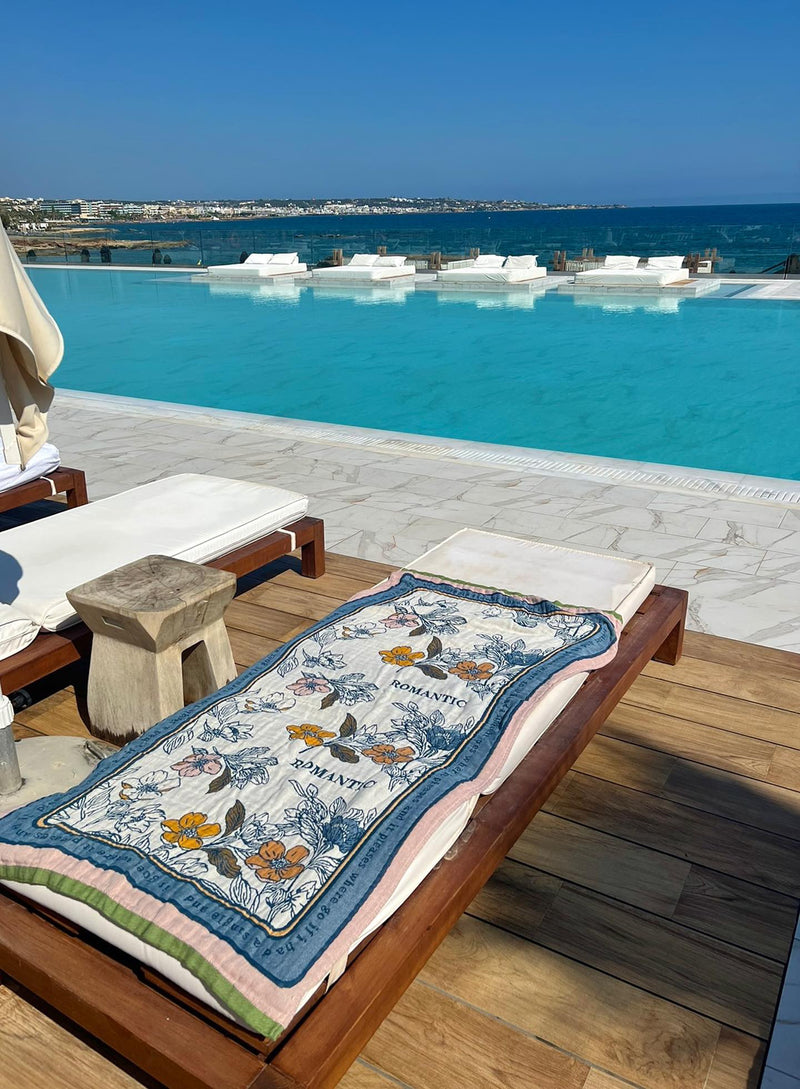 Nordic Style Floral Towel on pool deck with sun lounger, creating a relaxing ambiance.