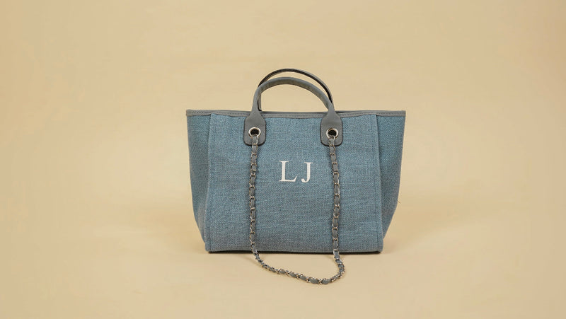 blue canvas tote bag with chain